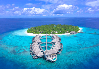 Aerial View of Outrigger island Resort at Konotta Maldives Canva Pro Aerial View of Outrigger island Resort at Konotta Maldives Canva Pro