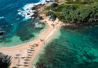 Aerial view of blue beach island Drone view of the beaches of Sri Lanka Canva Pro Aerial view of blue beach island Drone view of the beaches of Sri Lanka Canva Pro