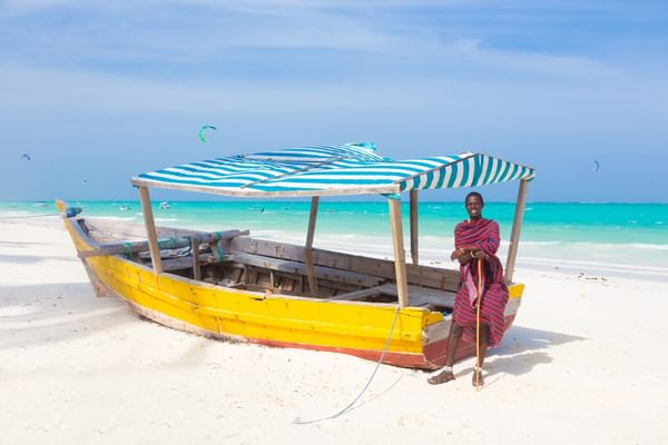 African man with a boat Zanzibar African man with a boat Zanzibar