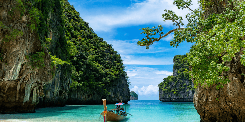 Boat in Loh Samah Bay in Phi Phi Island Thailand Canva Pro Boat in Loh Samah Bay in Phi Phi Island Thailand Canva Pro