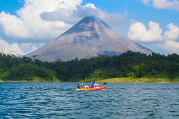 Couple kayaking on Lake Arenal Couple kayaking on Lake Arenal