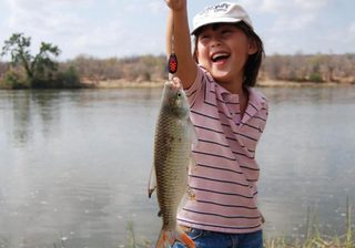 Fishing At Azura Selous Girl With Her Catch Fishing At Azura Selous Girl With Her Catch