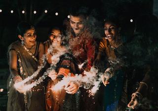 Happy Family Celebrating Diwali