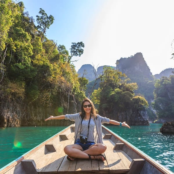Karsts in thailand woman on a boat