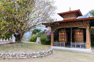 Large prayer wheels in Khamsum Yuelley Namgyal Chorten Punakha Bhutan
