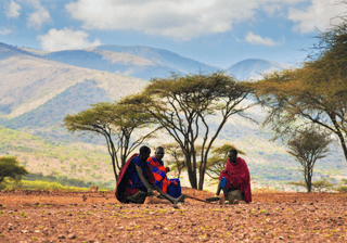 Maasai Men Sitting Savannah Landscape in Tanzania Africa Canva Pro Maasai Men Sitting Savannah Landscape in Tanzania Africa Canva Pro