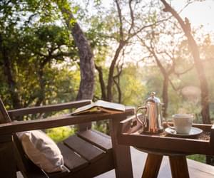Morning coffee private deck Kambaku River Sands Kruger South Africa min
