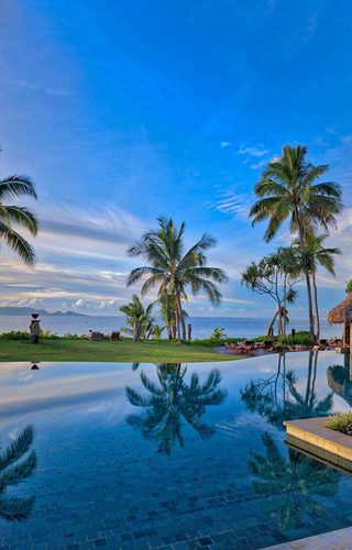 Nanuku resort fiji pacific harbour infinity pool view palmtrees jpg Nanuku resort fiji pacific harbour infinity pool view palmtrees jpg