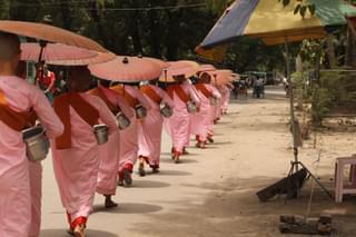 Nuns in procession Mandalay Myanmar min