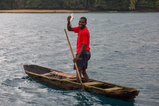 Principe Fisherman On Canoe Principe Fisherman On Canoe