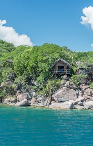 Pano view tents an beach Mumbo Island Lodge Malawi Pano view tents an beach Mumbo Island Lodge Malawi