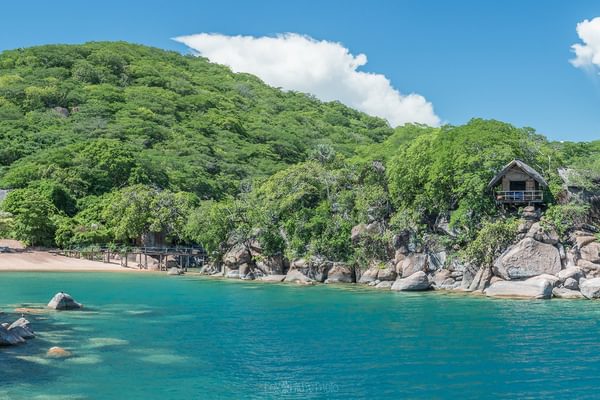 Pano view tents an beach Mumbo Island Lodge Malawi Pano view tents an beach Mumbo Island Lodge Malawi