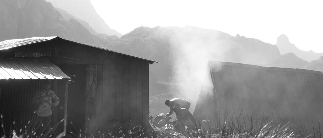 Porters Cooking Bugata Camp