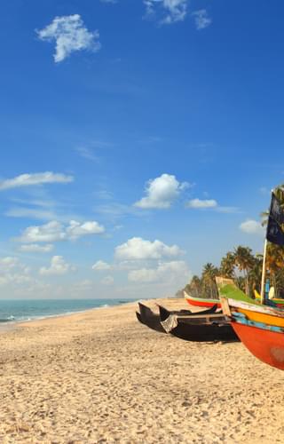 Sand Sea And Boats In Kerala