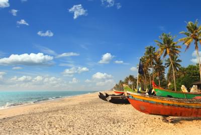 Sand Sea And Boats In Kerala