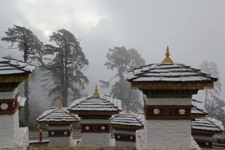 Snow on the Memorial Chortens of Dochula Pass in Thimphu Bhutan