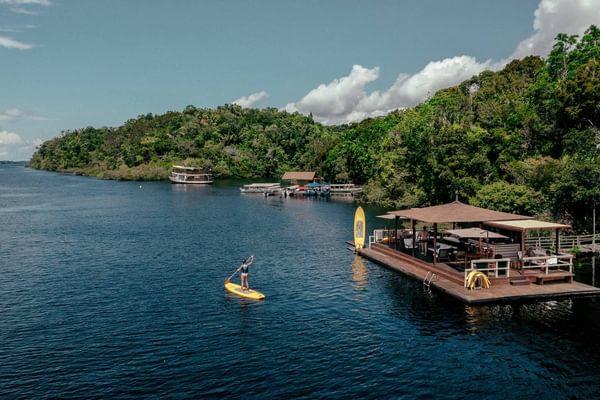 Stand up paddleboarding Anavilhanas Lodge Amazon Brazil Stand up paddleboarding Anavilhanas Lodge Amazon Brazil