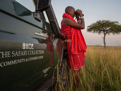 The Safari Collection Looking out for Lion with th Conservation Car at Salas Camp The Safari Collection Looking out for Lion with th Conservation Car at Salas Camp