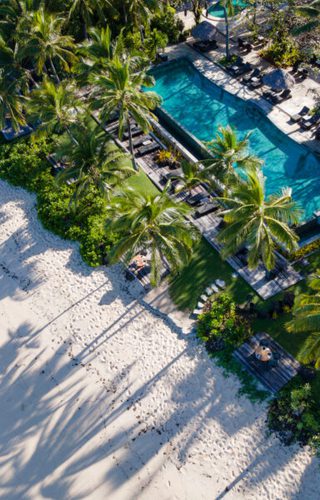 Tokoriki island resort aerial view pool palm trees jpg Tokoriki island resort aerial view pool palm trees jpg