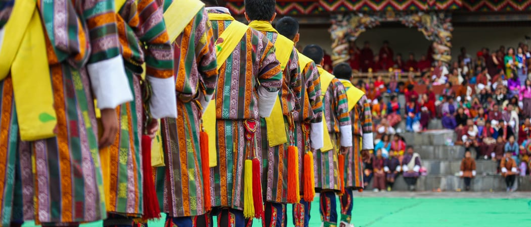 Traditional dancers Thimphu Tshechu Tashichho Dzong Thimphu Bhutan min