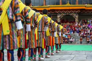 Traditional dancers Thimphu Tshechu Tashichho Dzong Thimphu Bhutan min
