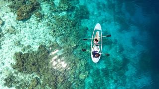 Two Person Riding Kayak Maldives Canva Pro Two Person Riding Kayak Maldives Canva Pro