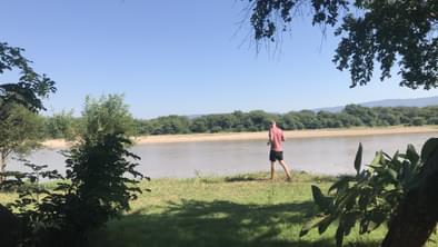 Walking along the banks of the Luangwa River at Munyamadzi Game Reserve