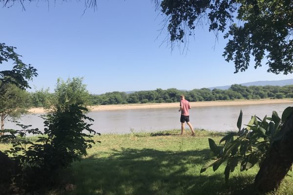 Walking along the banks of the Luangwa River at Munyamadzi Game Reserve Walking along the banks of the Luangwa River at Munyamadzi Game Reserve