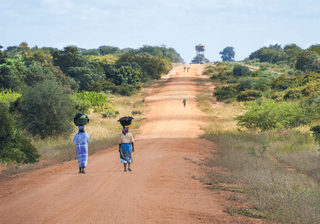 Women Walking Along Road Mozambique Canva Pro Women Walking Along Road Mozambique Canva Pro