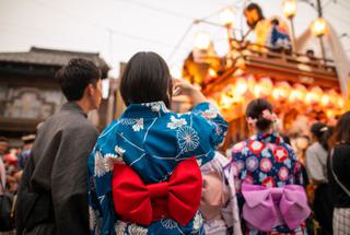 Young couple in yukata at matsuri parade Japan canva pro