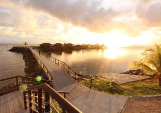 Aga reef resort samoa aerial shot over bridge decking walk bungalows jpg Aga reef resort samoa aerial shot over bridge decking walk bungalows jpg