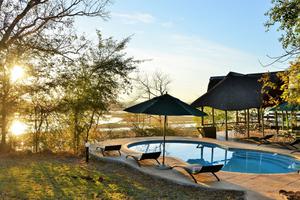 Muchenje Safari Lodge Pool At Sunset