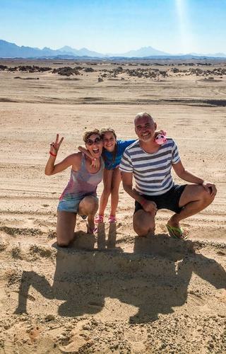 Family in Egyptian desert Canva Pro