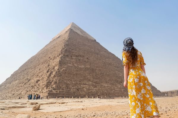 Tourist in front of Pyramid of Giza Cairo Egypt Tourist in front of Pyramid of Giza Cairo Egypt
