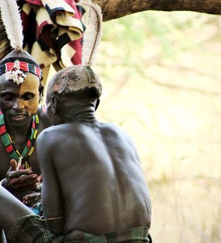 Ethiopia Omo Valley Karo Men Sitting Ethiopia Omo Valley Karo Men Sitting