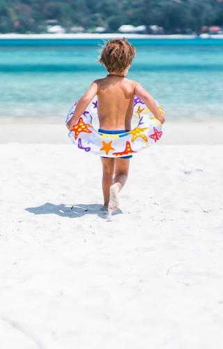 Child on the Beach Spice Island resort Grenada Caribbean