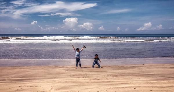 Children on the beach Aceh Indonesia min