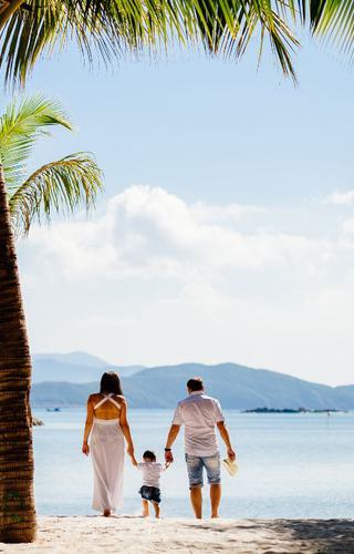 Family on the beach in the Caribbean