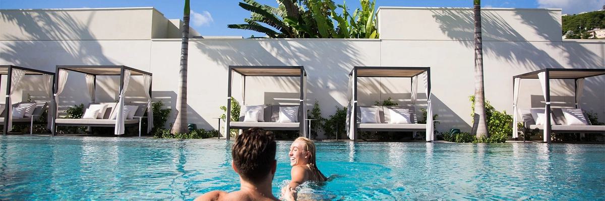 Couple in the Pool Silversands Resort Grand Anse Grenada Caribbean Couple in the Pool Silversands Resort Grand Anse Grenada Caribbean