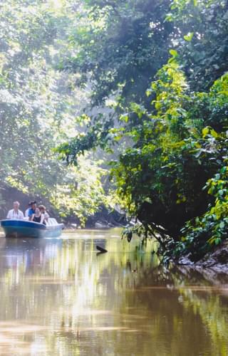 Kinabatangan river with tourists Borneo