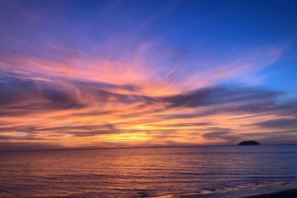 Sunset over beach Borneo Malaysia Sunset over beach Borneo Malaysia