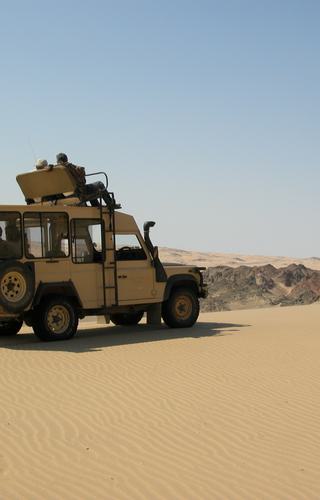 Sandy driving Skeleton Coast Namibia